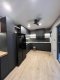 Baan Klang Muang Ratchaphruek – Brand by AP 3-Storey Townhome | Prime Corner Plot | Opposite Central Westville Fully furnished with premium built-ins, featuring a Signature Kitchen with special design.