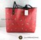 NEW C​O​A​C​HReversible City Tote with baby bouquet print