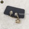 Chanel 21P Script Dangling CC Turn-Lock Clip-On Earrings Matte Gold Hardware