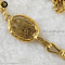 Chanel Chanel gold braid necklace with CC fob. Measures 78″ total.