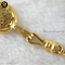 Chanel Chanel gold braid necklace with CC fob. Measures 78″ total.