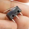 อะไหล่เปลี่ยนปุ่มกดเม้าส์ OMRON Micro Switch JAPAN (D2F-01FL) วางบนมือ