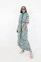 เดรสยาวคอปีน ทรงป้าย ชายระบายเฉลียง ลายพิมพ์ดอกเดซี่ ORIENTAL BREEZE WRAP DRESS (DAISY FIELD)