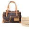 LOUIS VUITTON Limited Edition Monogram Canvas Riveting