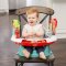 INFANTINO เก้าอี้หัดนั่งทานข้าวพกพา พร้อมของเล่น GAGA (4-48m)