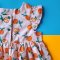 BUTTONS FRONT FLUTTER SLEEVES ORANGE PRINT ROMPER LIGHT PEACH 100% PRINTED COTTON