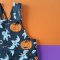 BOYS&GIRLS HALLOWEEN GINGERBREAD BLACK PINAFORE 100%PRINTED COTTON