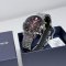 Casio Edifice EFR-575D-4A red dial watch in a retailer's lifestyle display