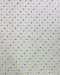 Cotton fabric with a multicolored polka-dot print.