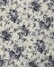 Cotton fabric with a floral vine print.