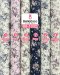 Cotton fabric with a floral vine print.