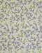 Cotton fabric printed with a small lemon-and-stem pattern.