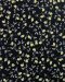 Cotton fabric printed with a small lemon-and-stem pattern.
