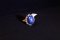 "Tanusorn Natural Star Sapphire 16.90 carat Ring Adorned with Tourmaline Gemstone"