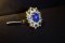 "Tanusorn Natural Star Sapphire 22 carat Ring Adorned with Blue Topaz Gemstone"