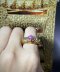 A golden ruby fang ring