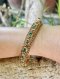 Emerald Bangle with Diamond Spacers and Ruby Surround