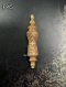 Antique Thai engraved gold Takrut adorned with an emerald finial, vintage Buddhist amulet